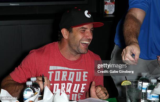 Rider and television host T.J. Lavin attends Touchdown for Charity's celebrity fantasy football draft at Born and Raised Tavern/Lounge on September...