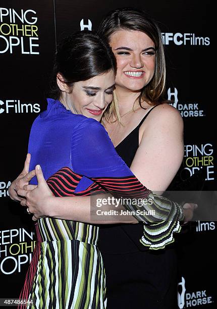 Actress Lizzy Caplan and Director Leslye Headland attend the Los Angeles premiere of IFC Films "Sleeping with Other People" presented by Dark Horse...