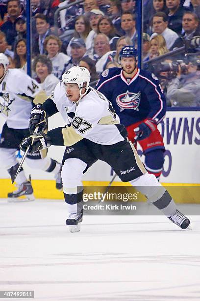 Sidney Crosby of the Pittsburgh Penguins controls the puck during Game Six of the First Round of the 2014 NHL Stanley Cup Playoffs against the...