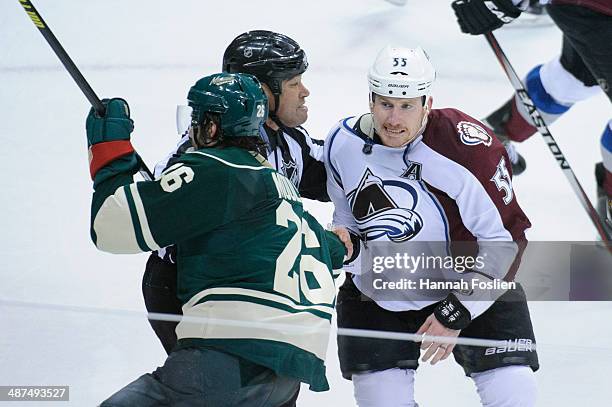 Linesman Jay Sharrers pulls apart Matt Moulson of the Minnesota Wild and Cody McLeod of the Colorado Avalanche after the Minnesota Wild won Game Six...