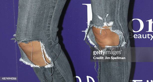 Actress Maggie Q, pants detail, attends a screening of Film Movement's "Breathe" hosted by The Cinema Society and Dior Beauty at Tribeca Grand Hotel...