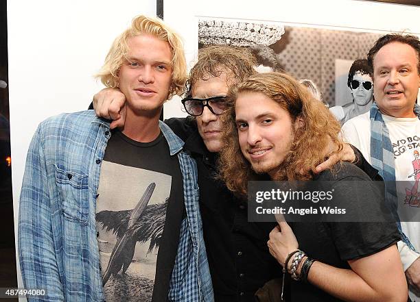 Singer Cody Simpson, photographer Mick Rock and Andrew Watt attend the TASCHEN Gallery opening reception for "Mick Rock: Shooting For Stardust - The...