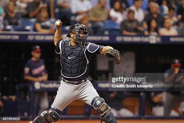 Josmil Pinto of the Minnesota Twins throws the ball against the Tampa Bay Rays at Tropicana Field on April 23, 2014 in St Petersburg, Florida.