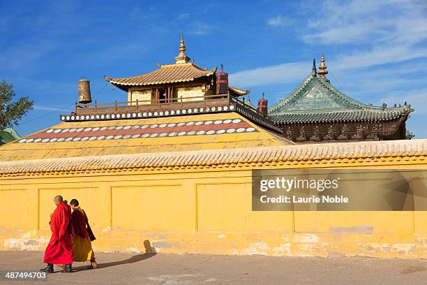 Monks and yellow temple wall, Gandan Monastery