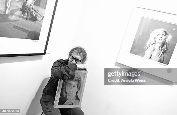 Photographer Mick Rock attends the TASCHEN Gallery opening reception for "Mick Rock: Shooting For Stardust - The Rise Of David Bowie & Co." at...