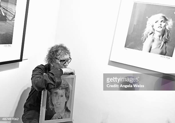 Photographer Mick Rock attends the TASCHEN Gallery opening reception for "Mick Rock: Shooting For Stardust - The Rise Of David Bowie & Co." at...