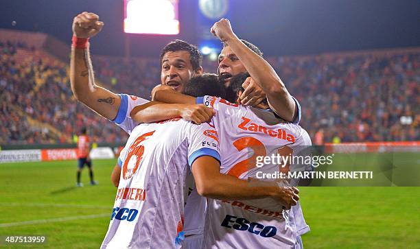 Argentina's Arnenal's footballer Diego Braghieri celebrates his goal against Chilean Union Espanola with teammates during their Copa Libertadores...