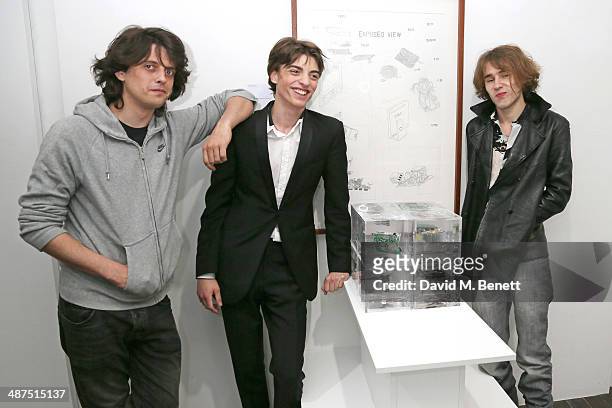 Fenton Bailey, Sascha Bailey and Connor Hirst attend a private view of "The Route Less Travelled" curated by Sascha Bailey for The Something Else...