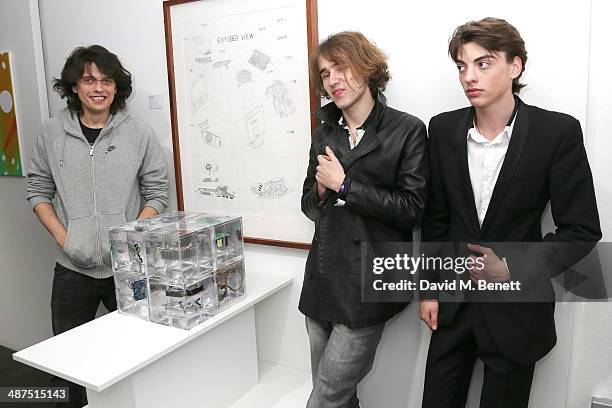 Fenton Bailey, Connor Hirst and Sascha Bailey attend a private view of "The Route Less Travelled" curated by Sascha Bailey for The Something Else...