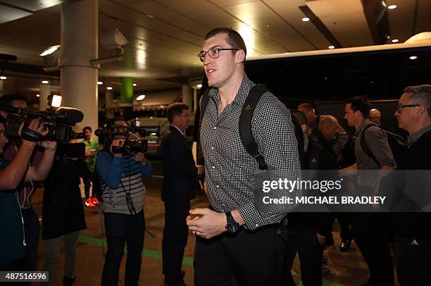 New Zealand All Blacks Brodie Retallick arrives at the Auckland International Airport in Auckland on September 10, 2015 before departing to the Rugby...