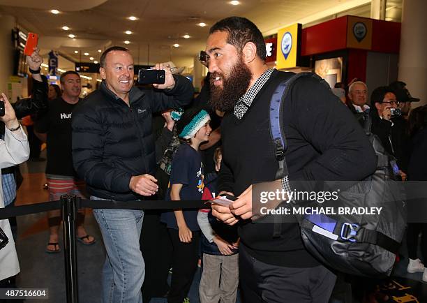 New Zealand All Blacks Charlie Faumuina arrives at the Auckland International Airport in Auckland on September 10, 2015 before departing to the Rugby...