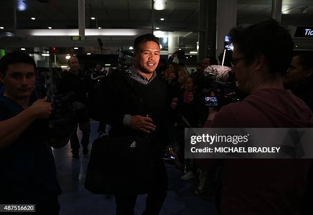 New Zealand All Blacks Keven Mealamu arrives at the Auckland International Airport in Auckland on September 10, 2015 before departing to the Rugby...