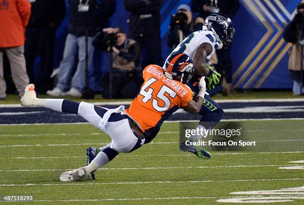 Ricardo Lockette of the Seattle Seahawks catches a pass over Dominique Rodgers-Cromartie of the Denver Broncos during Super Bowl XLVIII on February...