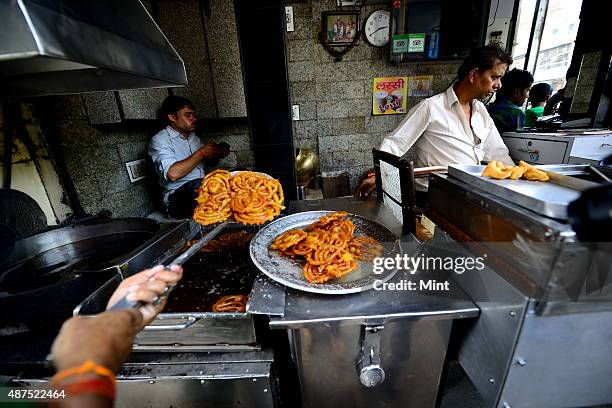 The old famous Jalebi wala at the corner of Dariba in Chandni Chowk, on August 20, 2014 in New Delhi, India. Chandni Chowk , often called the food...