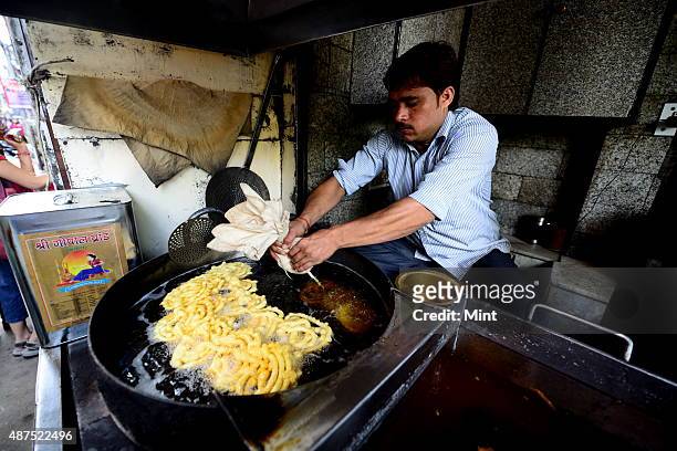 The old famous Jalebi wala at the corner of Dariba in Chandni Chowk, on August 20, 2014 in New Delhi, India. Chandni Chowk , often called the food...