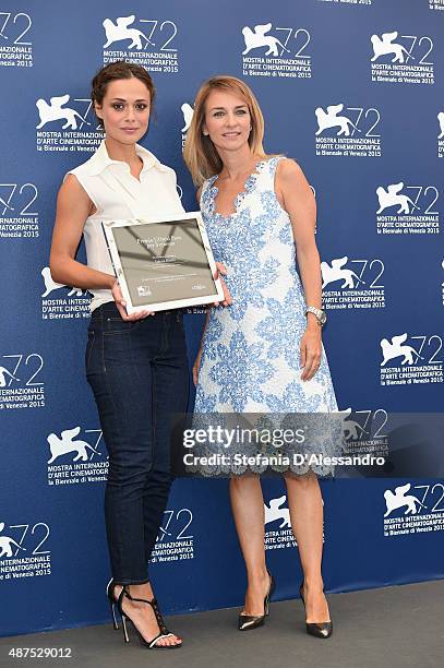 Brand director of L'Oreal Paris Italia Stefania Fabiano poses with winner Valeria Bilello at a photocall for L'Oreal Paris Award For Cinema during...