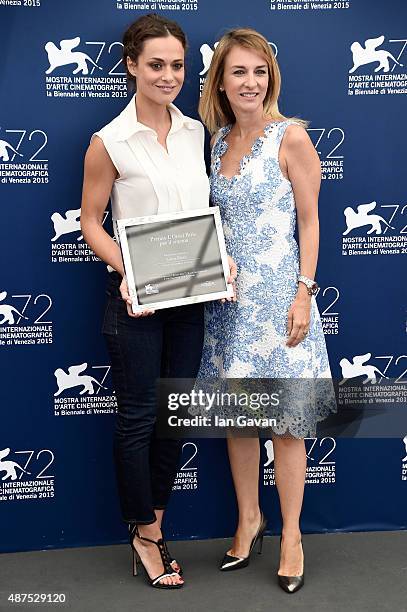 Brand director of L'Oreal Paris Italia Stefania Fabiano poses with winner Valeria Bilello at a photocall for L'Oreal Paris Award For Cinema during...