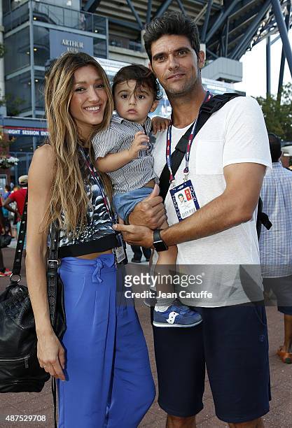 Mark Philippoussis of Australia poses with his wife Silvana Lovin Philippoussis and their son Nicholas Philippoussis in front of Arthur Ashe Stadium...