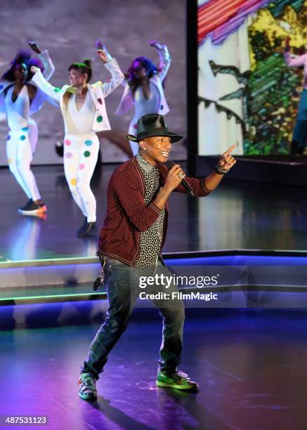 Pharrell Williams performs on stage at Google presents YouTube Brandcast event at The Theater at Madison Square Garden on April 30, 2014 in New York...