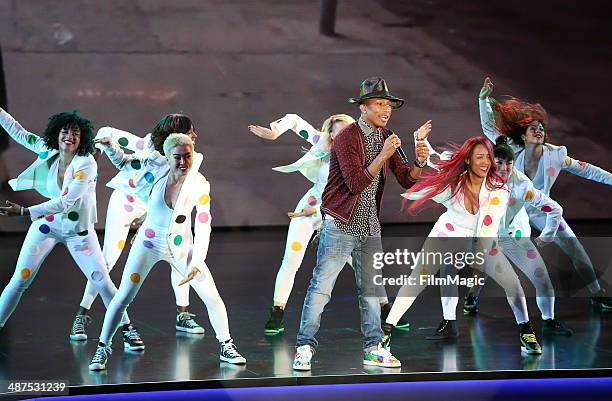 Pharrell Williams performs on stage at Google presents YouTube Brandcast event at The Theater at Madison Square Garden on April 30, 2014 in New York...