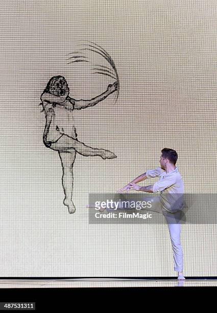 Dancer Travis Wall performs on stage at Google presents YouTube Brandcast event at The Theater at Madison Square Garden on April 30, 2014 in New York...