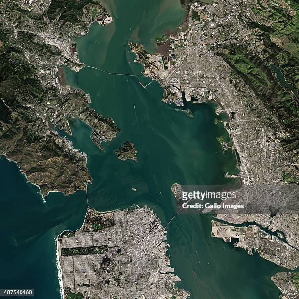 Satellite image of the three bridges of eight bridges that cross the San Francisco Bay on March 18, 2014 in California, United States. To the left is...