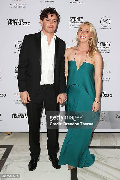 Vincent Fantauzzo and Asher Keddie arrive for Vincent Fantauzzo's unveiling of Charlize Theron portrait dinner and red carpet event at The Langham...