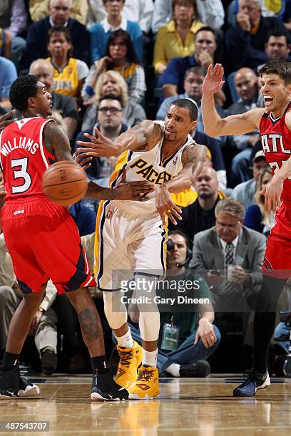 George Hill of the Indiana Pacers passes the ball against the Atlanta Hawks during Game Five of the Eastern Conference Quarterfinals at the Bankers...
