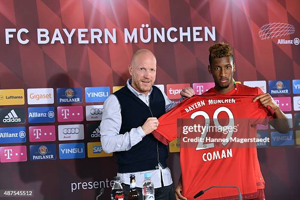 Kingsley Coman and Matthias Sammer during the 'FC Bayern Muenchen Unveils New Signing Kingsley Coman' at press center of FC Bayern on September 10,...