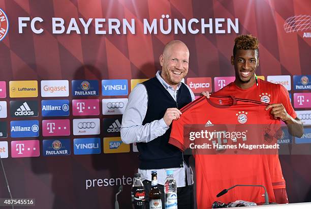 Kingsley Coman and Matthias Sammer during the 'FC Bayern Muenchen Unveils New Signing Kingsley Coman' at press center of FC Bayern on September 10,...