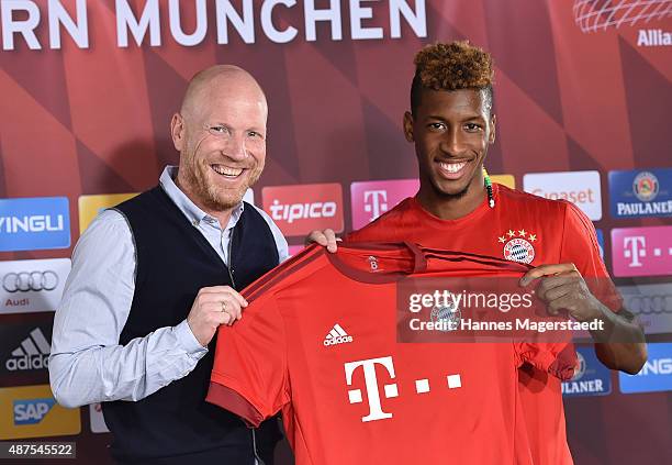 Kingsley Coman and Matthias Sammer during the 'FC Bayern Muenchen Unveils New Signing Kingsley Coman' at press center of FC Bayern on September 10,...