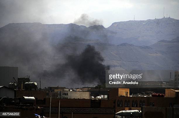 Smoke rises after the war crafts belonging to the Saudi-led coalitions bomb Houthi controlled areas in Sana'a, Yemen on September 10, 2015.