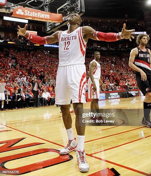 Dwight Howard of the Houston Rockets gets the crowd going after a defensive stop with less than two minutes to go in Game 5 of the Western Conference...