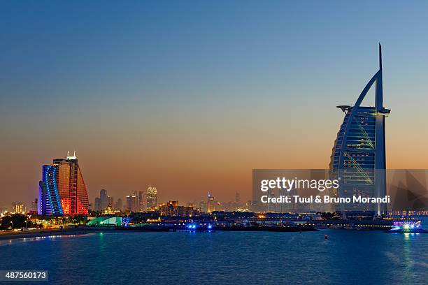 dubai, jumeira beach hotel and burj al arab hotel - dubai stock pictures, royalty-free photos & images