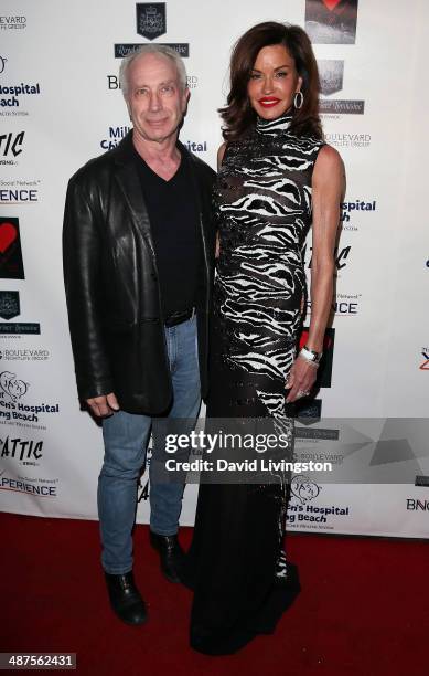 Dr. Robert Gerner and TV personality Janice Dickinson attend "30 Years of Music, Art & Fashion" benefiting Miller Children's Hospital at The Attic on...