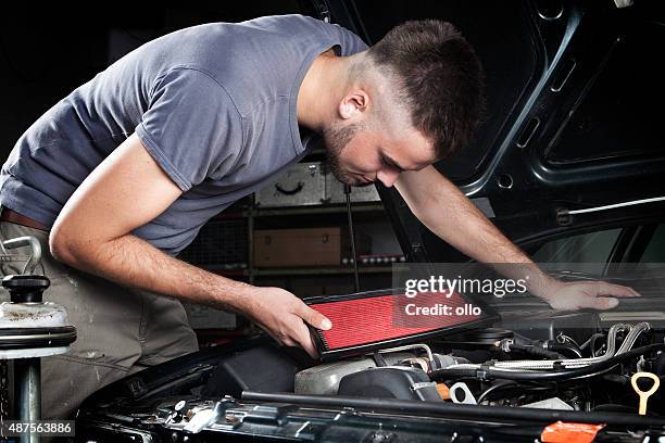 mechanic car repair engine motor - air purifier stock pictures, royalty-free photos & images