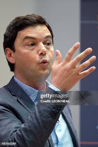 French economist Thomas Piketty speaks to students and guests during a presentation at King's College, central London, on April 30, 2014. Piketty...