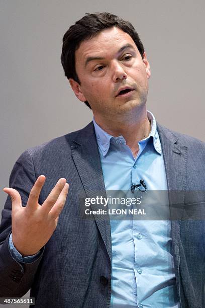 French economist Thomas Piketty speaks to students and guests during a presentation at King's College, central London, on April 30, 2014. Piketty...