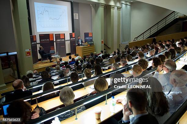 French economist Thomas Piketty speaks to students and guests during a presentation at King's College, central London, on April 30, 2014. Piketty...