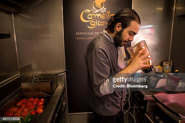 David Barquet, owner and chef of the Camello Gitano Lebanese food truck, prepares a salsa chile at the Street Food Center in a park in the Roma...