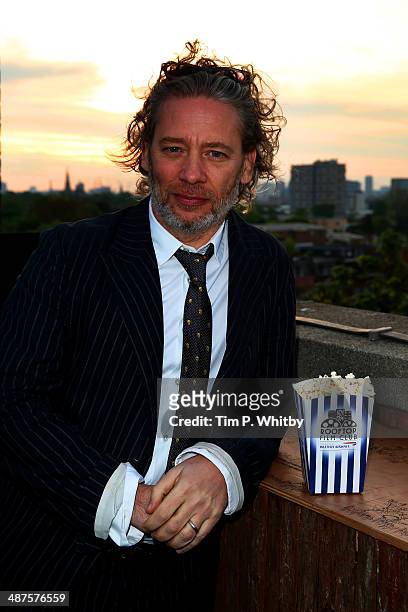 Dexter Fletcher attends the launch night of the Rooftop Film Club presented by British Airways at The Bussey Building on April 30, 2014 in London,...