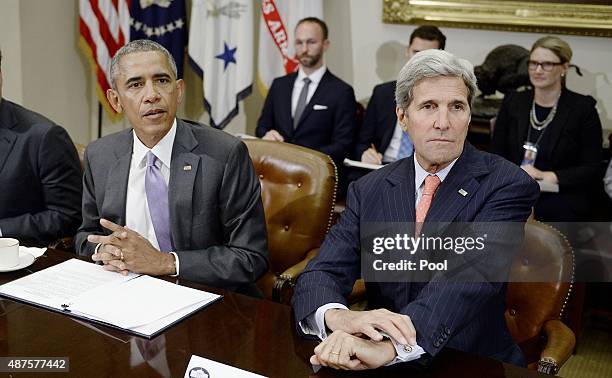 President Barack Obama and Secretary of State John Kerry meet with a small group of veterans and Gold Star Mothers to discuss the Iran nuclear deal...