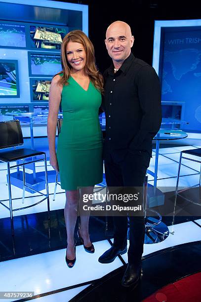 The Intelligence Report" host Trish Regan poses with Andre Agassi during his visit to FOX Business Network at FOX Studios on September 10, 2015 in...