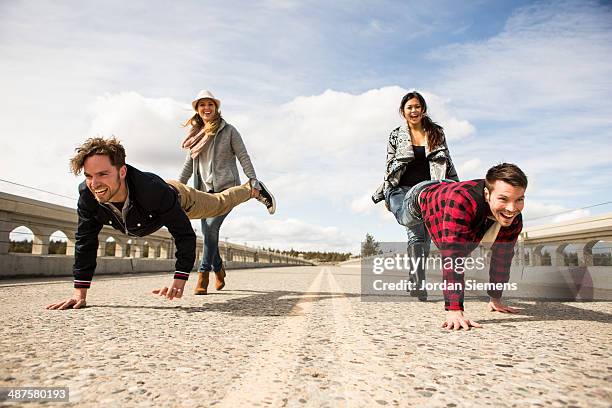 Wheelbarrow Racing Wheelbarrow Race Adults Photos and Premium High Res Pictures - Getty Images