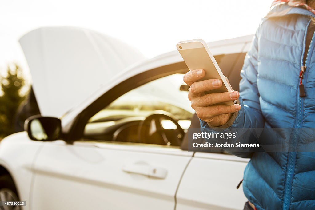 A female with car troubles. .