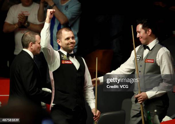 Barry S. Hawkins celebrates after beating Dominic Dale on Day twelve of the Dafabet World Snooker Championship at the Crucible Theatre on April 30,...