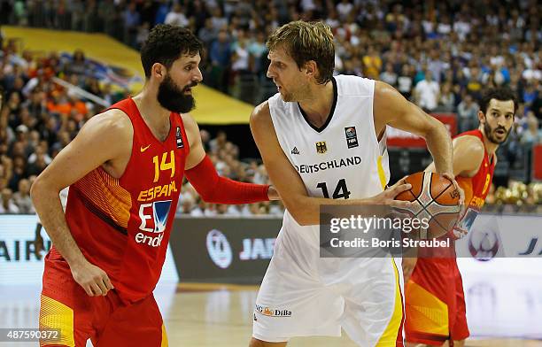 Dirk Nowitzki of Germany drives to the basket against Nikola Mirotic of Spain during the FIBA EuroBasket 2015 Group B basketball match between...