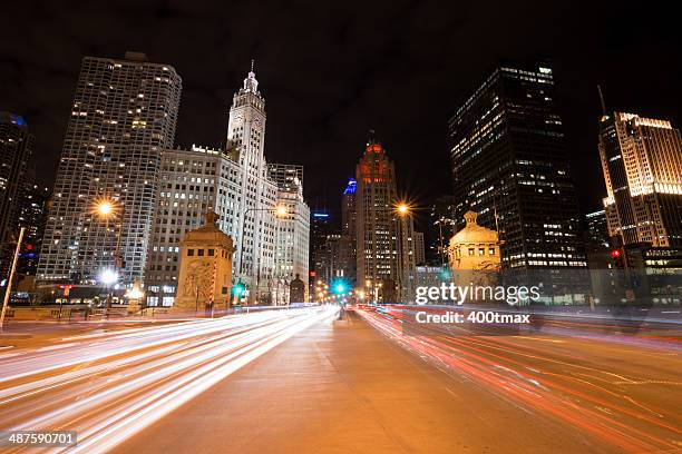 michigan ave - bright chicago city lights stock-fotos und bilder