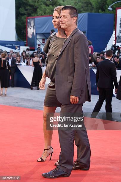 Emmanuel Carrere and Helene Devynck attend a premiere for 'Remember' during the 72nd Venice Film Festival at Sala Grande on September 10, 2015 in...