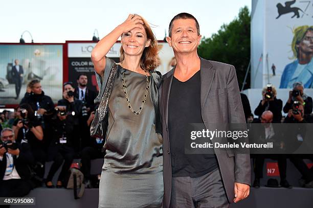 Emmanuel Carrere and Helene Devynck attend a premiere for 'Remember' during the 72nd Venice Film Festival at Sala Grande on September 10, 2015 in...